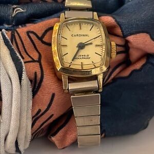 Cardinal Gold tone and Silver tone  Watch. Wind. Works well